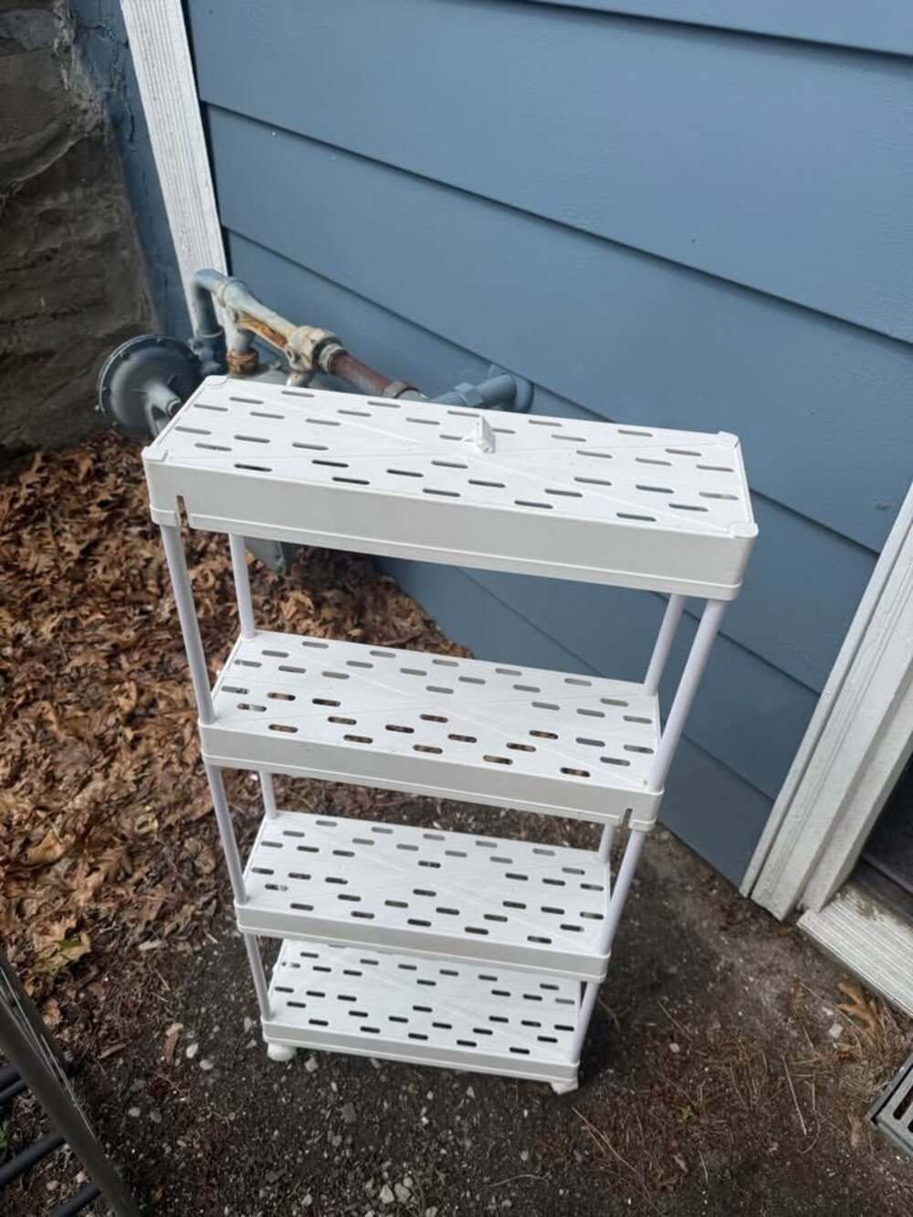 Tiered white plastic small rolling storage cart
